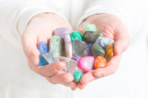 woman holding crystals